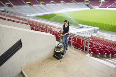 Cleaning a football stadium floor