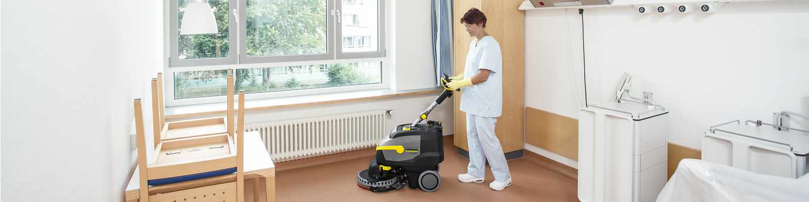 Scrubber dryer cleaning a hospital floor