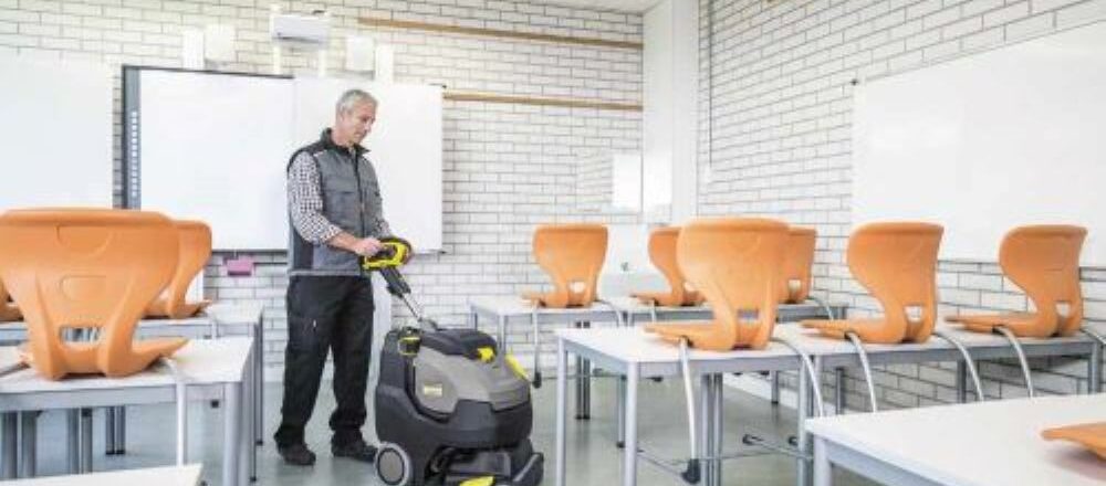 Deep cleaning a school floor with a scrubber dryer