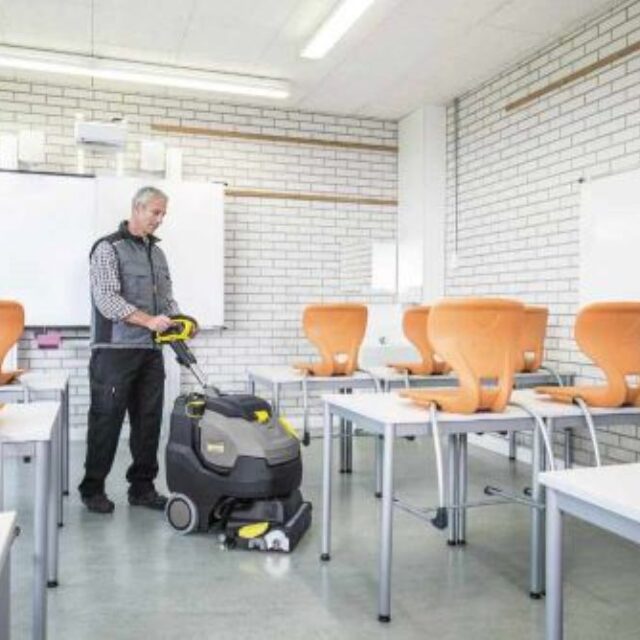Deep cleaning a school floor with a scrubber dryer