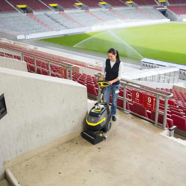 Scrubber dryer cleaning a sports stadium