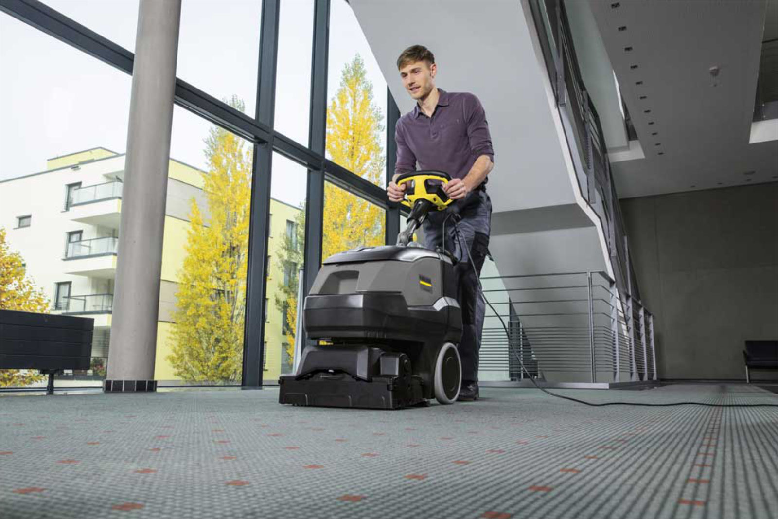 Office cleaning by a Karcher carpet extractor
